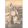 Muhu saar, Muhu naine vikati ja rehaga, ERM nr. 204, enne 1916